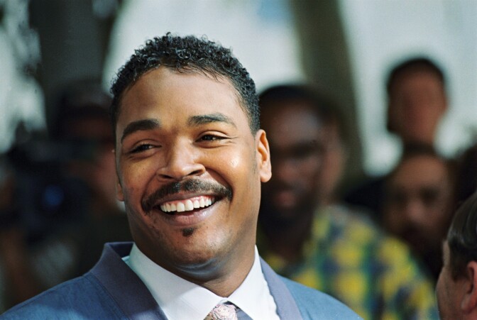 File: Rodney King, the Los Angeles motorist whose beating by police was captured on videotape, smiles, May 1, 1992 in Beverly Hills, during a press conference, where he called for the end of violence in the city.