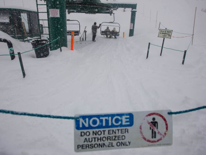 Skiers and snowboarders take to the slopes at Bear Mountain Lodge one day after resort shut down because of a massive manhunt for murder suspect Christopher Dorner.