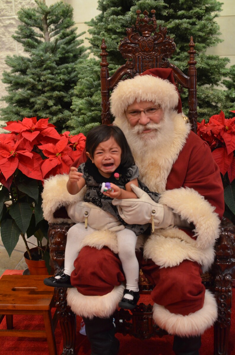 "We took my daughter to the Huntington Library for the Santa photo. We knew she was going to freak out, and she didn't disappoint. We're terrible parents."—Teresa Wang