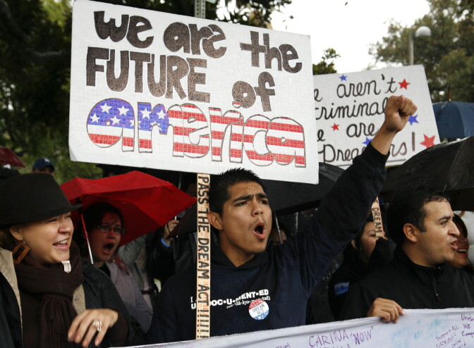 Undocumented college student Jorge Herrera, 18, center, of Carson rallies with students and Dream Act supporters in Los Angeles in Dec. 2010. 