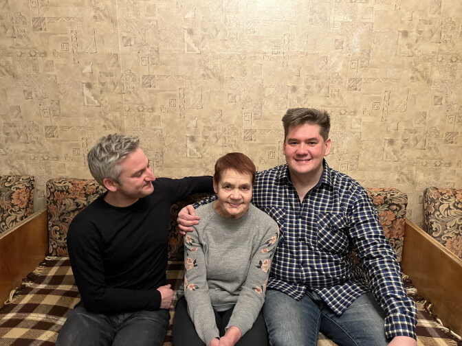 NPR's Daniel Estrin, left, with Lusia Kuznetsova, center, and her son Sergey Kuznetsov. Lusia is Estrin's grandfather's first cousin. Their extended families in the U.S. and Soviet Union went for decades without contact.