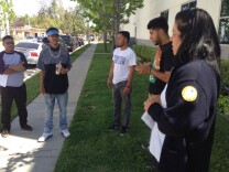 Students of WyoTech in Long Beach, a Corinthian Colleges campus, gather at their campus to find out what will happen after their school closed suddenly.